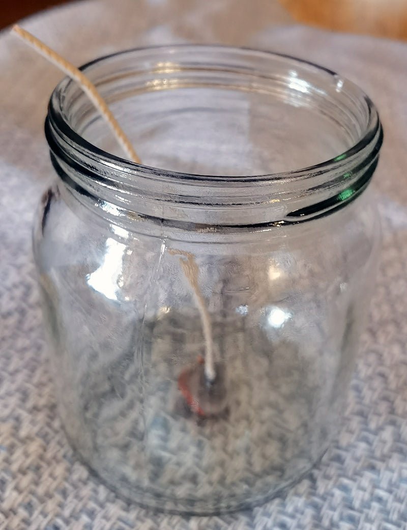How to secure a wick in a candle